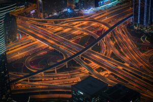 Complex highway interchange representing competing priorities and executive decision fatigue.